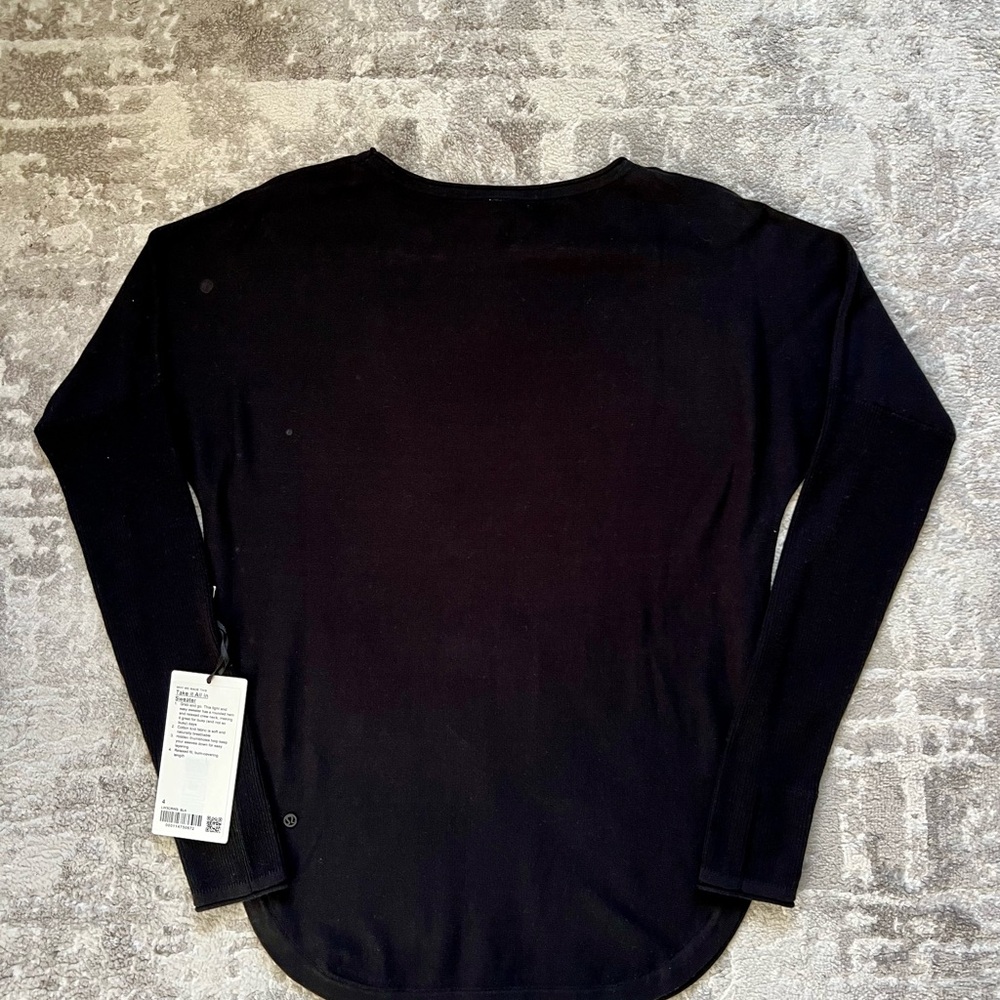 Brand new Lululemon Take it all in sweater, size 4